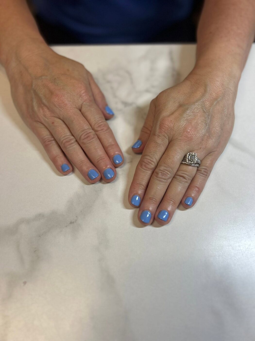 Cornflower blue gel manicure