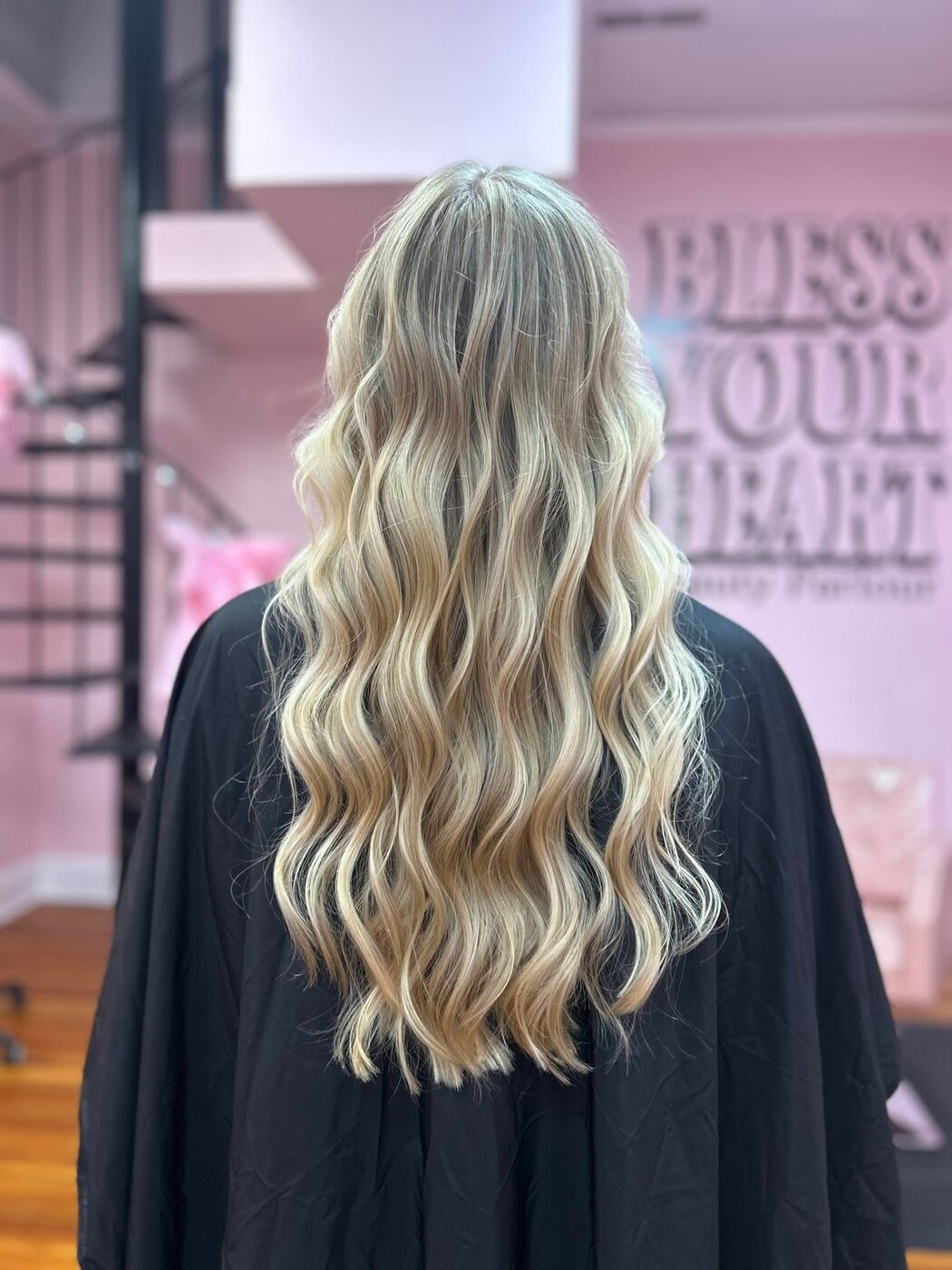 Long blonde balayage with soft waves